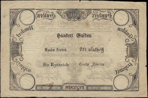 Alte deutsche 100-Pfennig-Banknote mit einem Mannporträt auf schwarzem Hintergrund.