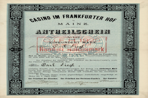Ein altes Aktienzertifikat mit schwarzem Rand und rotem Stempel, das den Text 'Casino im Frankfurter Hof Mainz' trägt.