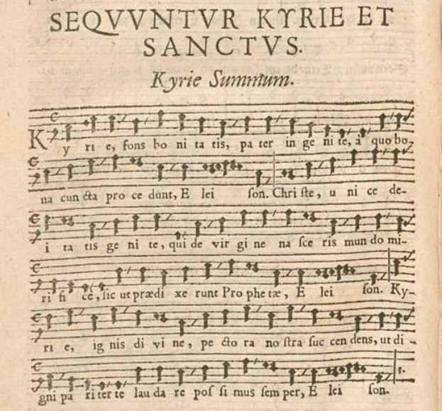 Ein aufgeschlagenes Buch mit Noten und Text, das als Musikbuch identifiziert werden kann.