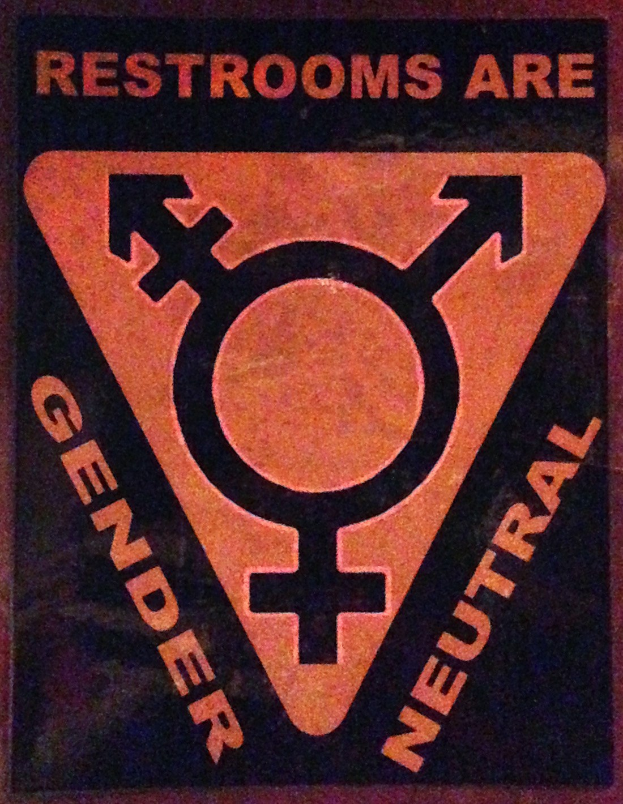 Plakat mit der Aufschrift "Geschlechterneutrale Toiletten" für genderneutrale Toiletten