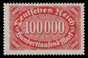 Ein roter Stempel mit der Aufschrift "Deutsches Reich" vor schwarzem Hintergrund.